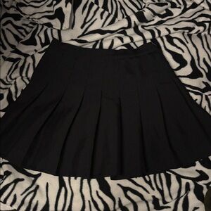 black pleated skirt